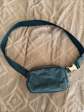 lululemon athletica Teal Crossbody Belt Bag with Gold Hardware